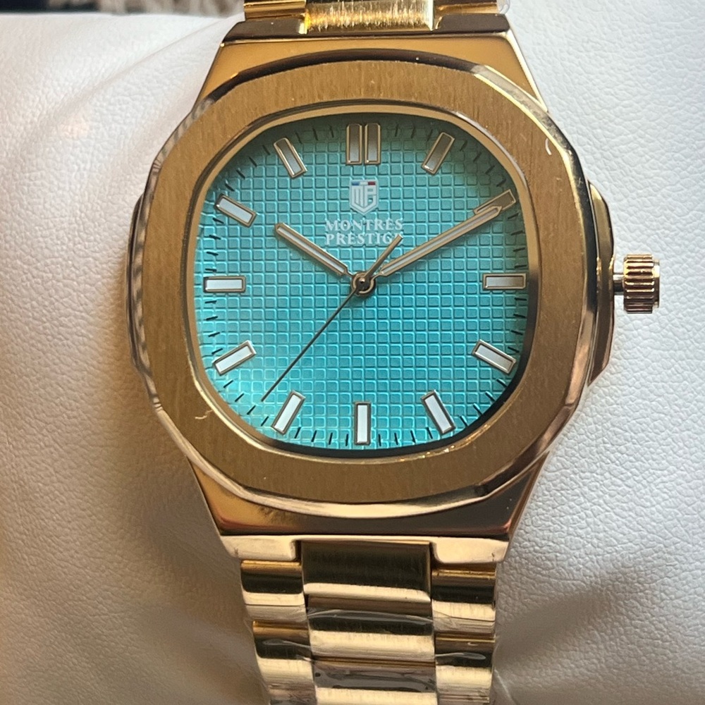 Montres Prestige Gold Tone Watch.